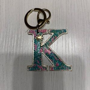K - Pink, gold, and green palm tree keychain